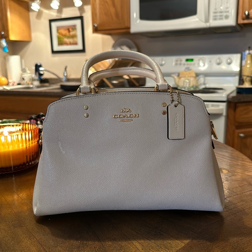Cream Coach Purse with gold details! Lightly used